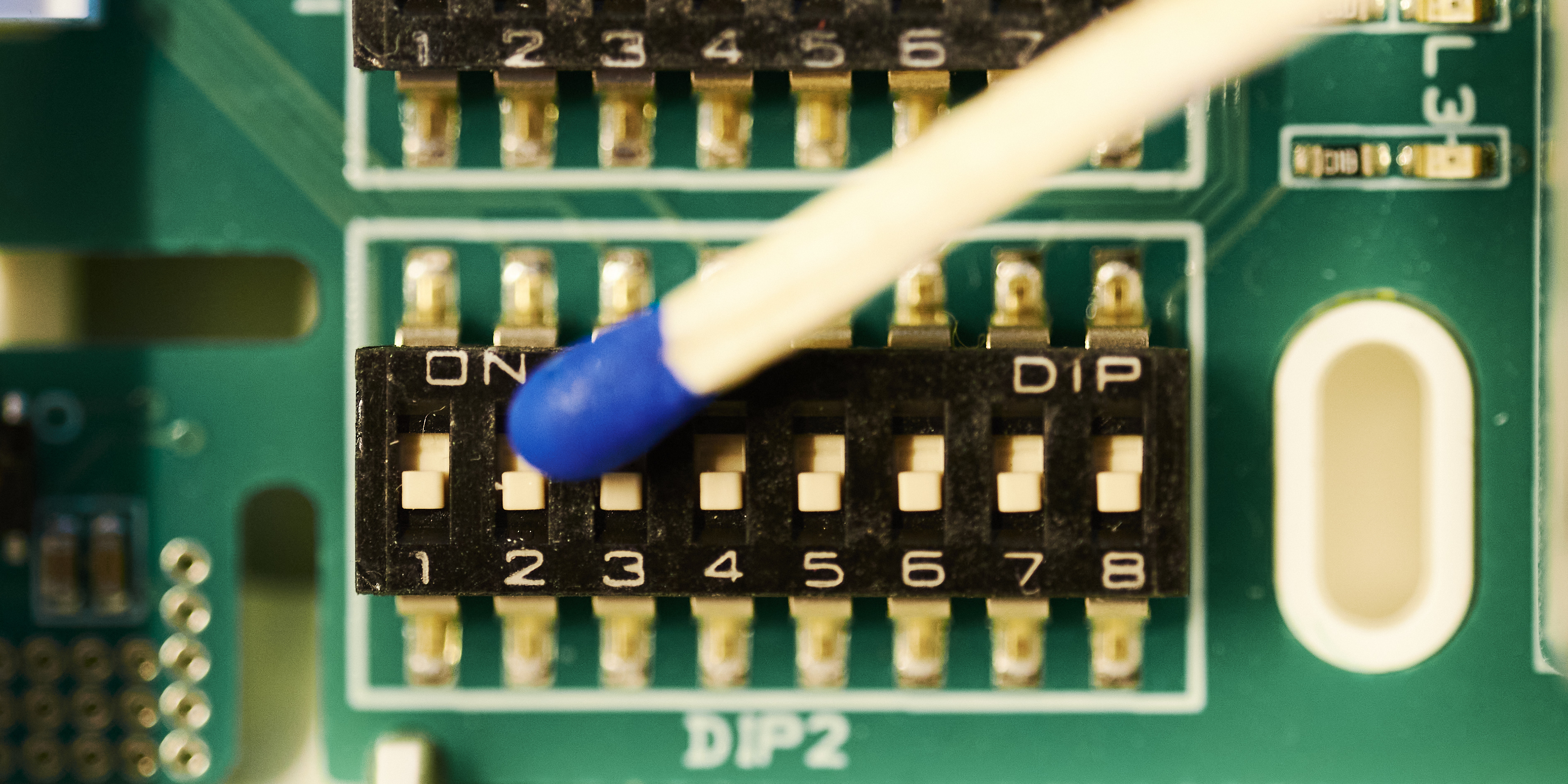 Close-up of DIP switches on HVAC controller